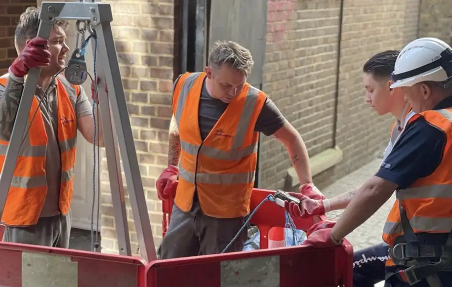 Pinpoint Drainage Services engineers preparing for a confined space entry operation using specialist safety equipment.